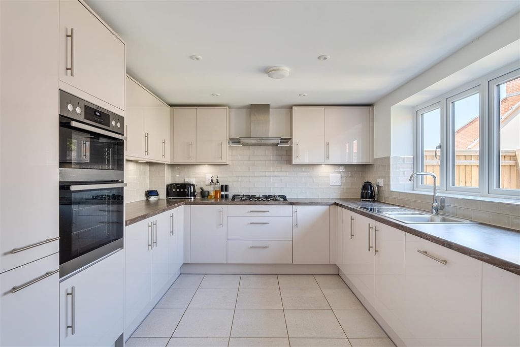 Property photo 2 of 17 Kitchen Area