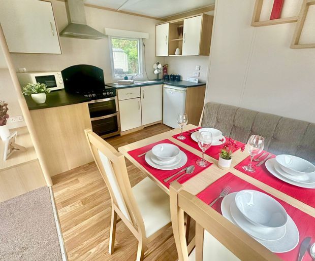 Property photo 2 of 5 Carnaby Accolade Dining Kitchen Area At Hoburne Bashley Holiday Park