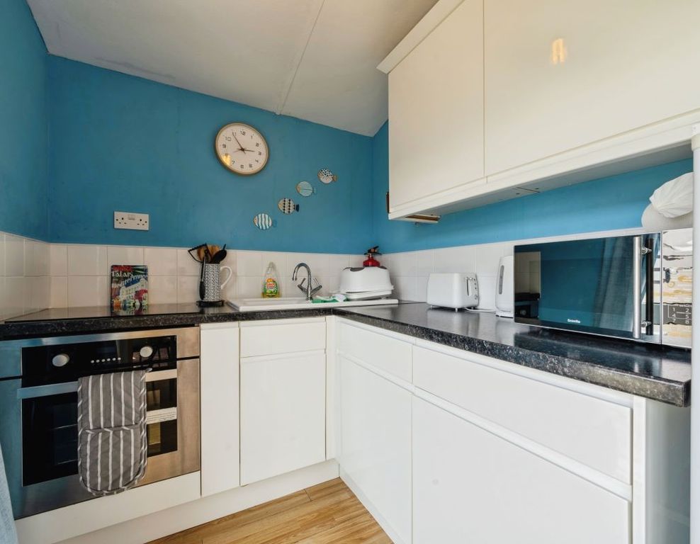 Property photo 3 of 6 Kitchen Area