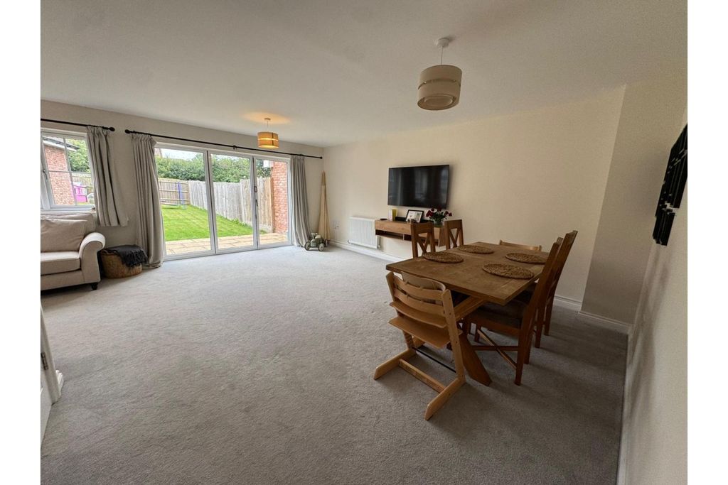 Property photo 3 of 10 Living / Dining Room
