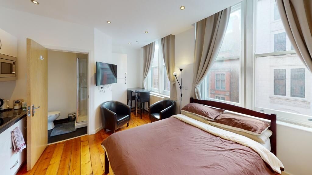 Property photo 3 of 9 Bright And Inviting Master Bedroom Featuring A Coz...