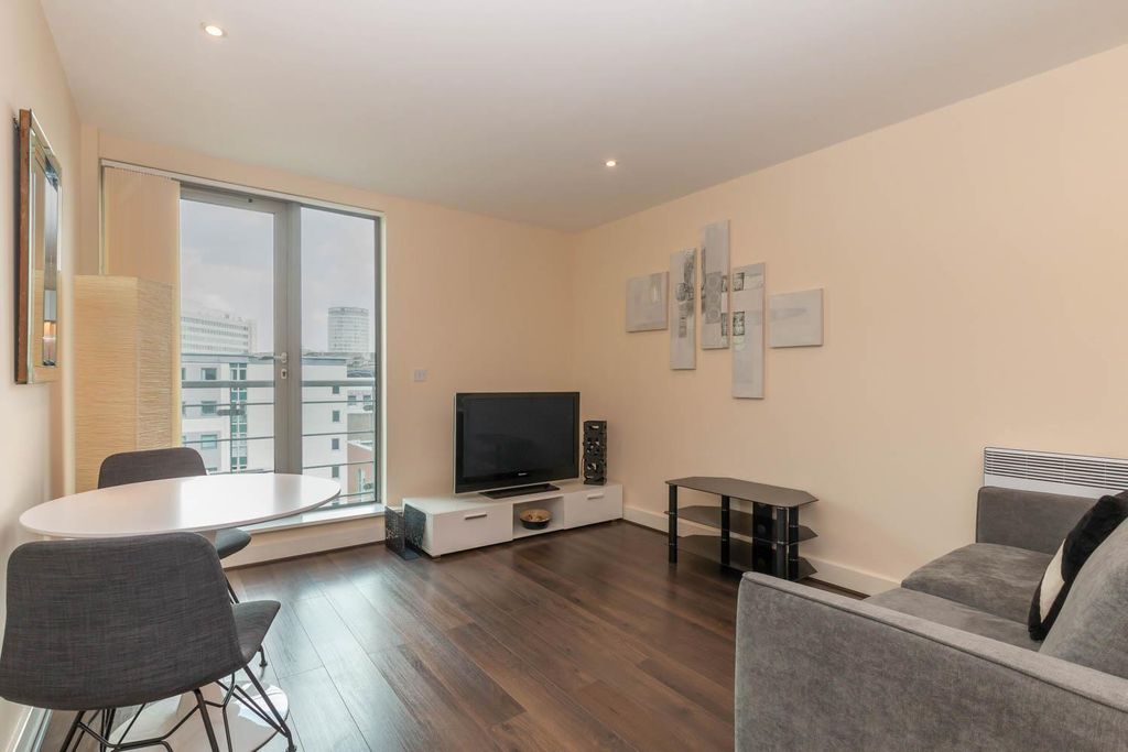 Property photo 1 of 10 Living Area