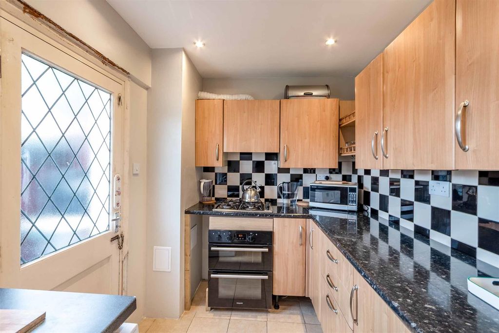 Property photo 3 of 17 Kitchen
