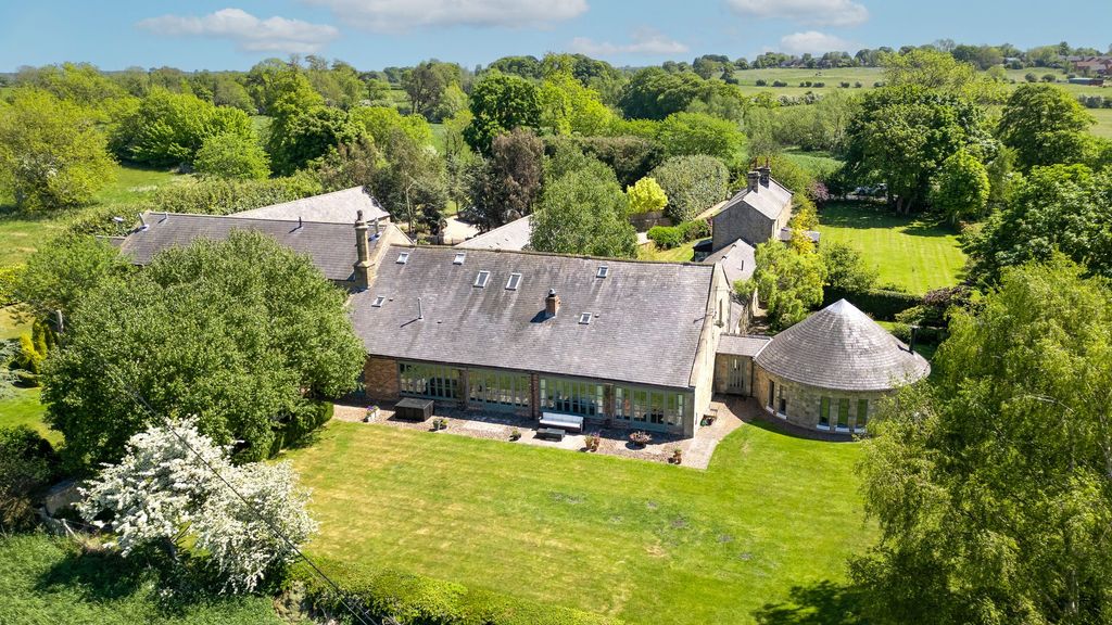 Property photo 3 of 57 Drone Rear Elevation