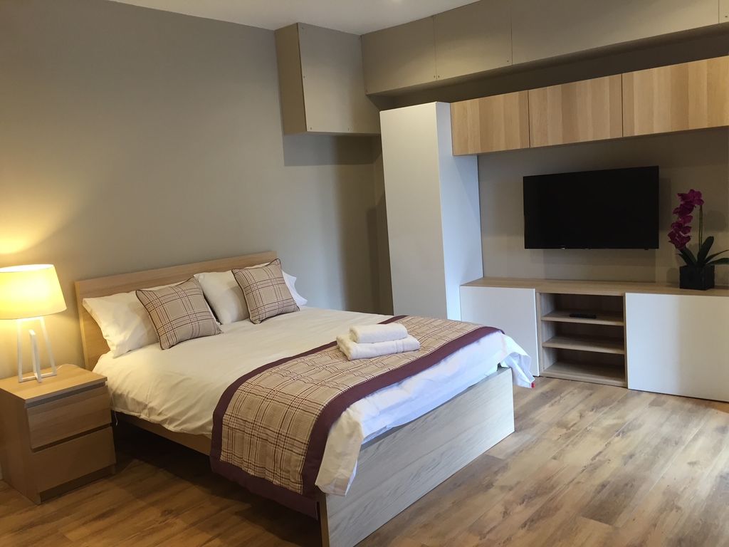 Property photo 1 of 6 Elegant Master Bedroom With Integrated Smart TV...