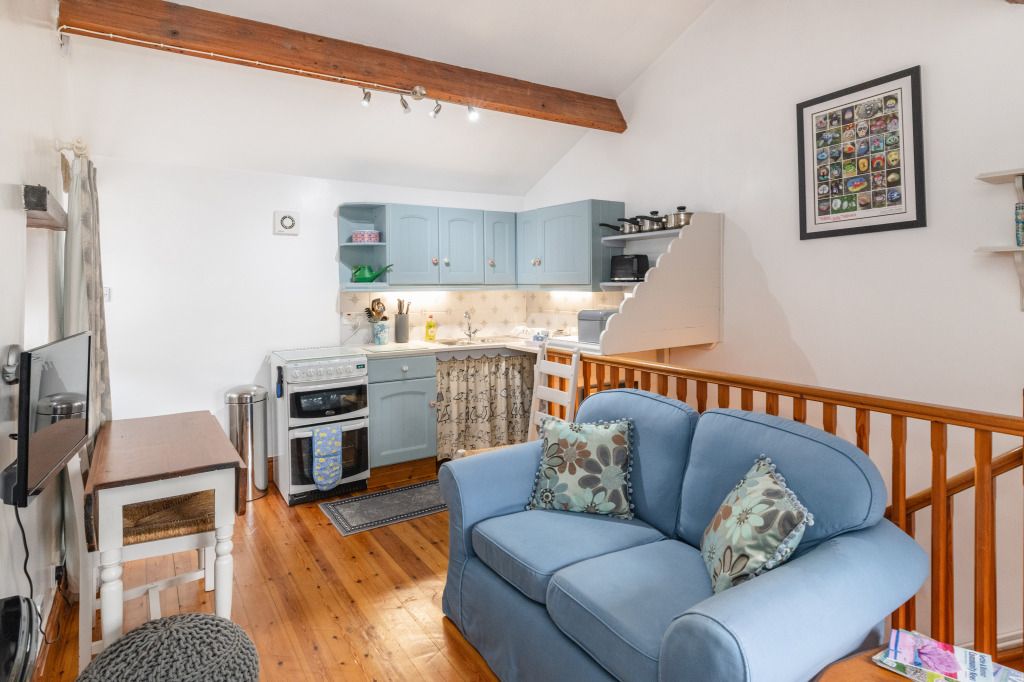 Property photo 2 of 11 Living Area