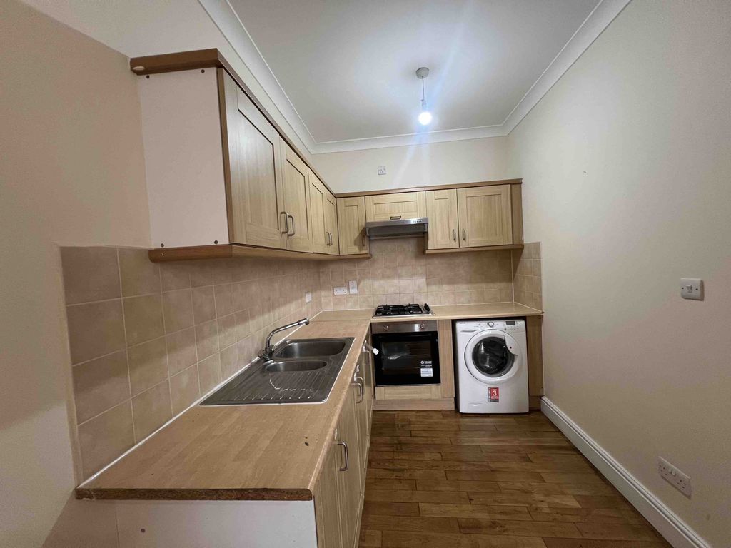 Property photo 2 of 8 Kitchen