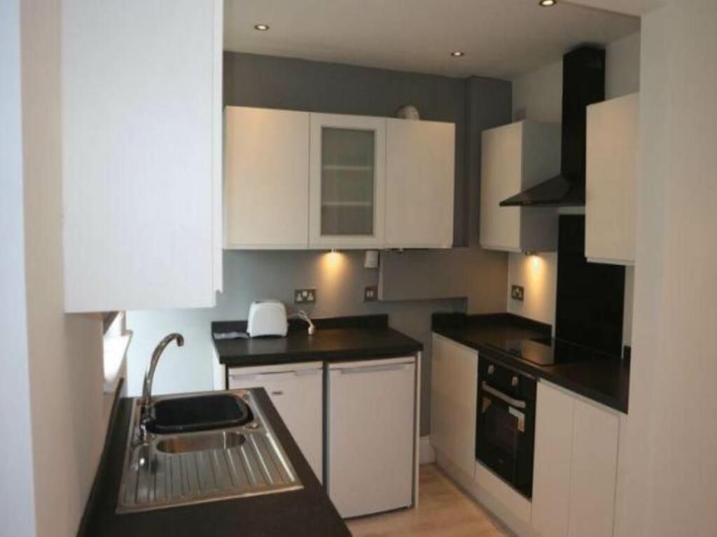 Property photo 2 of 11 Kitchen