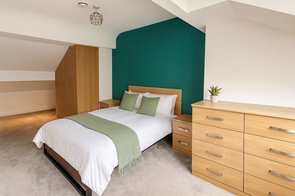 Property photo 3 of 6 A Bright And Welcoming Bedroom Featuring A Neatly ...