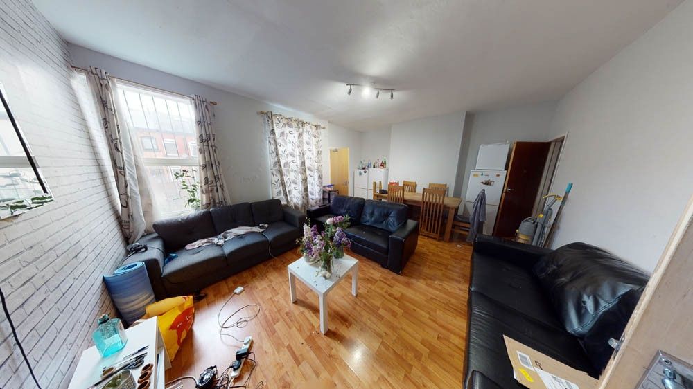 Property photo 1 of 6 Bright, Well-Furnished Living Room With Large Wind...