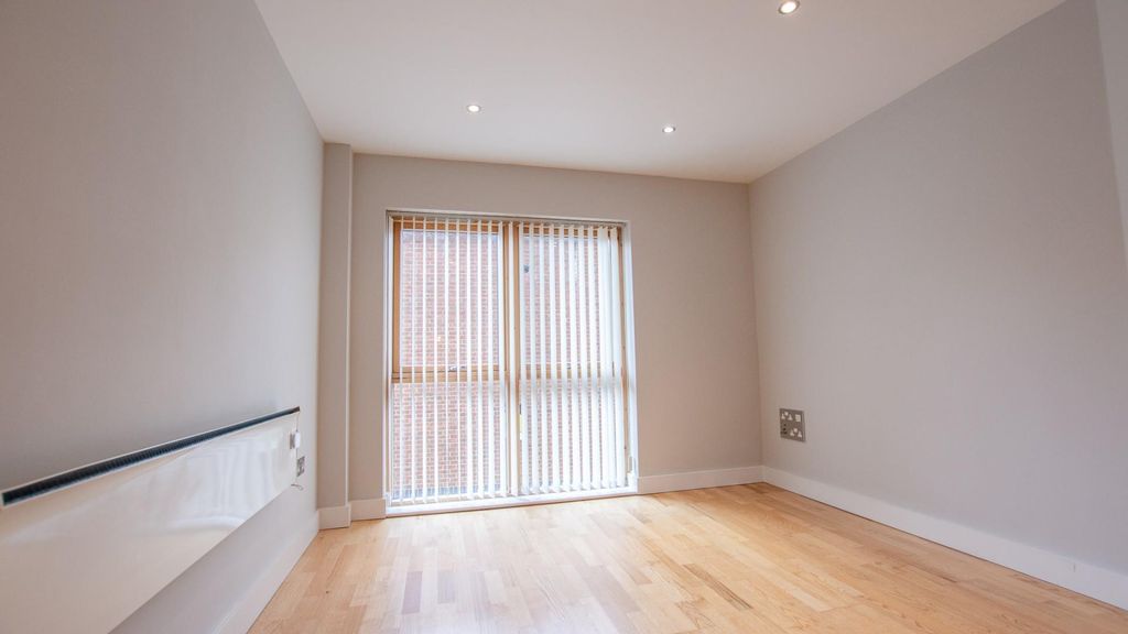 Property photo 3 of 8 Living Area