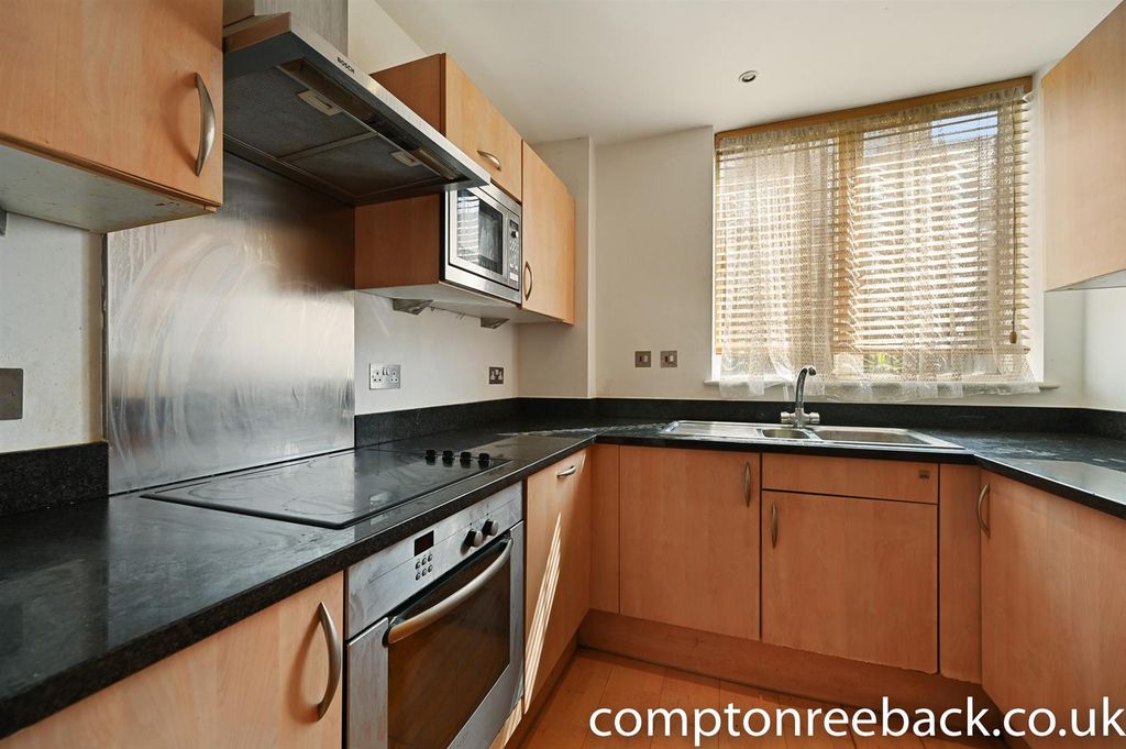 Property photo 2 of 8 Kitchen