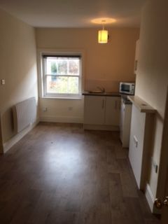 Property photo 3 of 8 Lounge And Kitchen Area