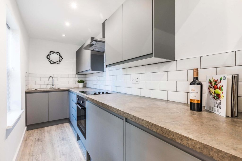 Property photo 3 of 7 Modern Fitted Kitchen With Grey Cabinetry, Long Wo...