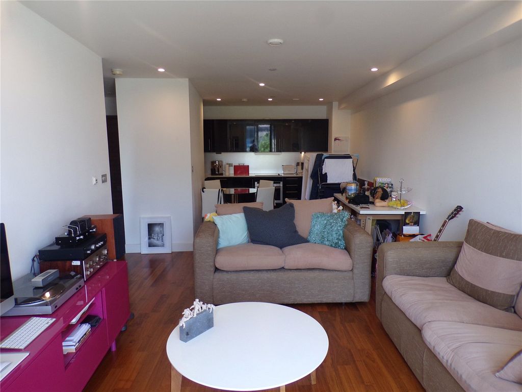 Property photo 3 of 11 Living Area