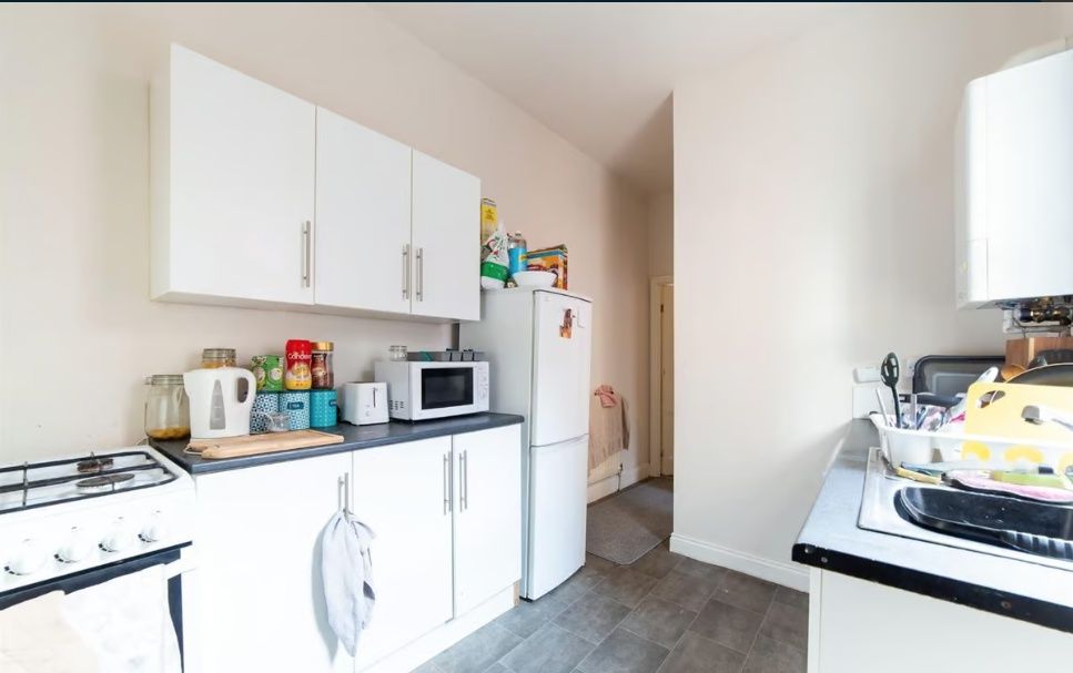 Property photo 1 of 6 Bright, Tidy Kitchen With White Cabinetry, Freesta...