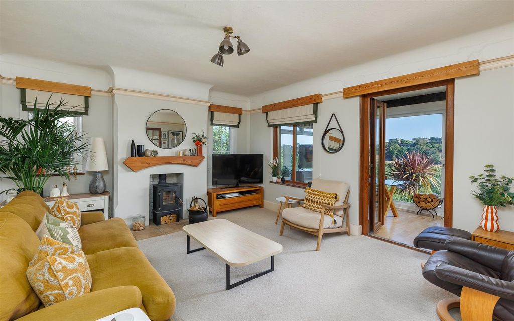 Property photo 2 of 35 Stylish Sitting Room With Log Burner
