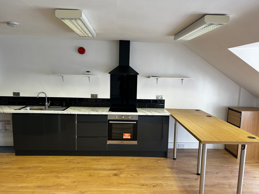 Property photo 1 of 8 Kitchen