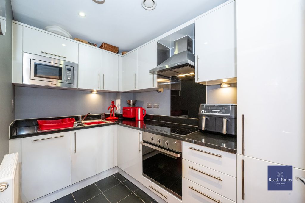 Property photo 3 of 13 Kitchen