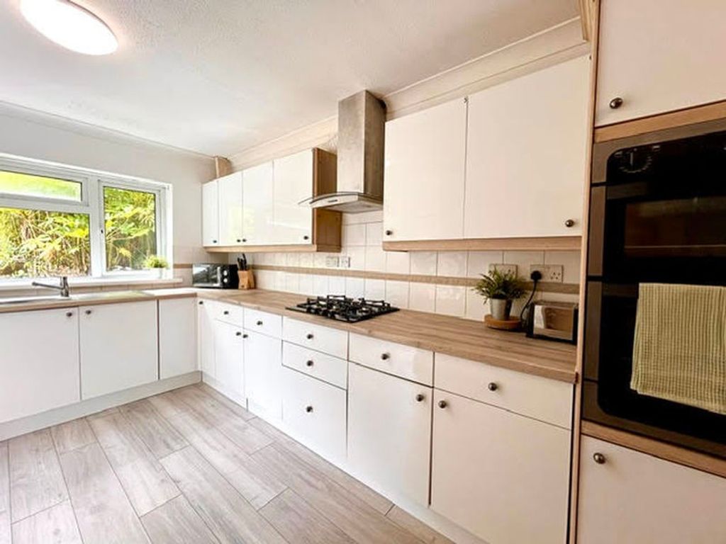 Property photo 3 of 8 A Bright And Modern Kitchen Featuring Ample Storag...