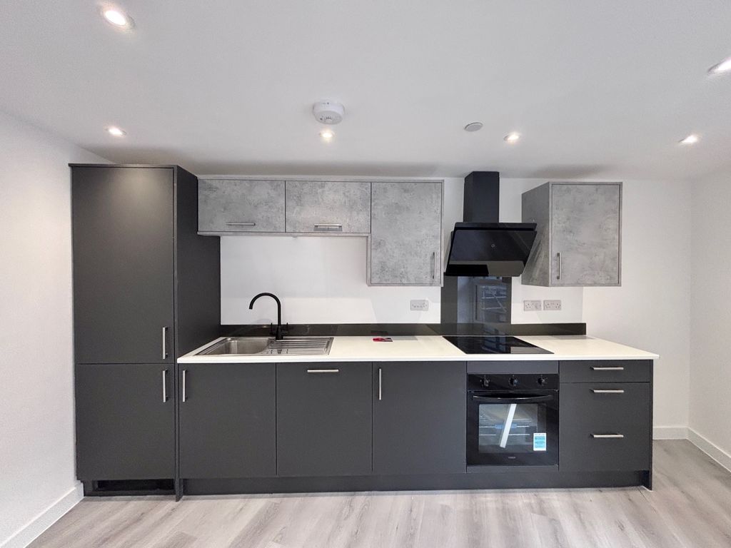 Property photo 3 of 8 Kitchen