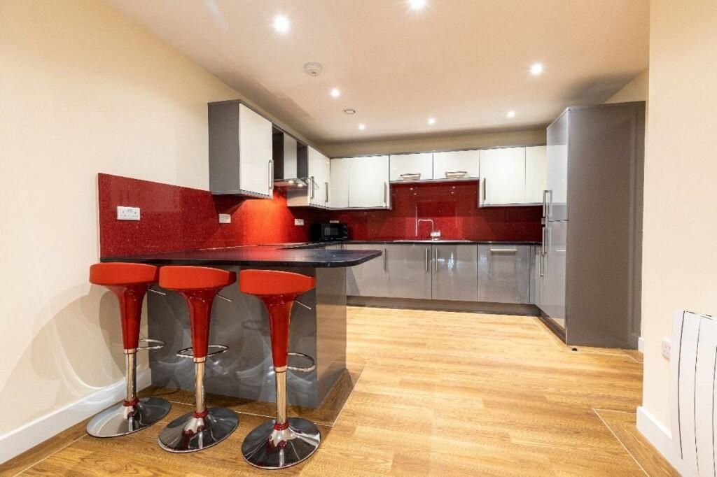Property photo 2 of 9 A Modern Kitchen With Ample Countertop Space And A...