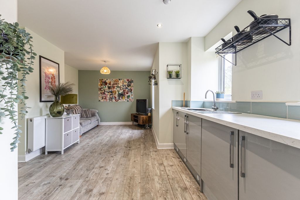 Property photo 2 of 13 Kitchen / Living Area