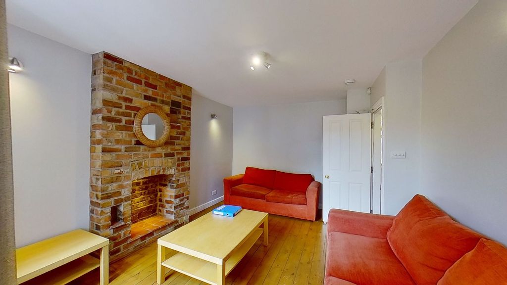 Property photo 1 of 11 Bright, Modern Living Room With Exposed Brick Fire...