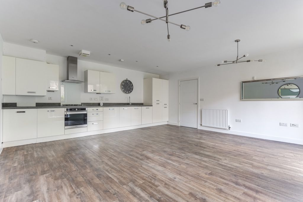 Property photo 3 of 18 Kitchen - Living Area