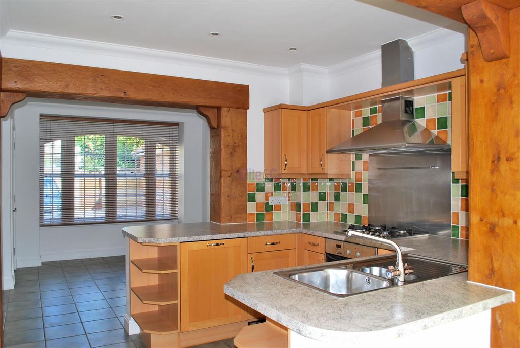 Property photo 3 of 12 Kitchen