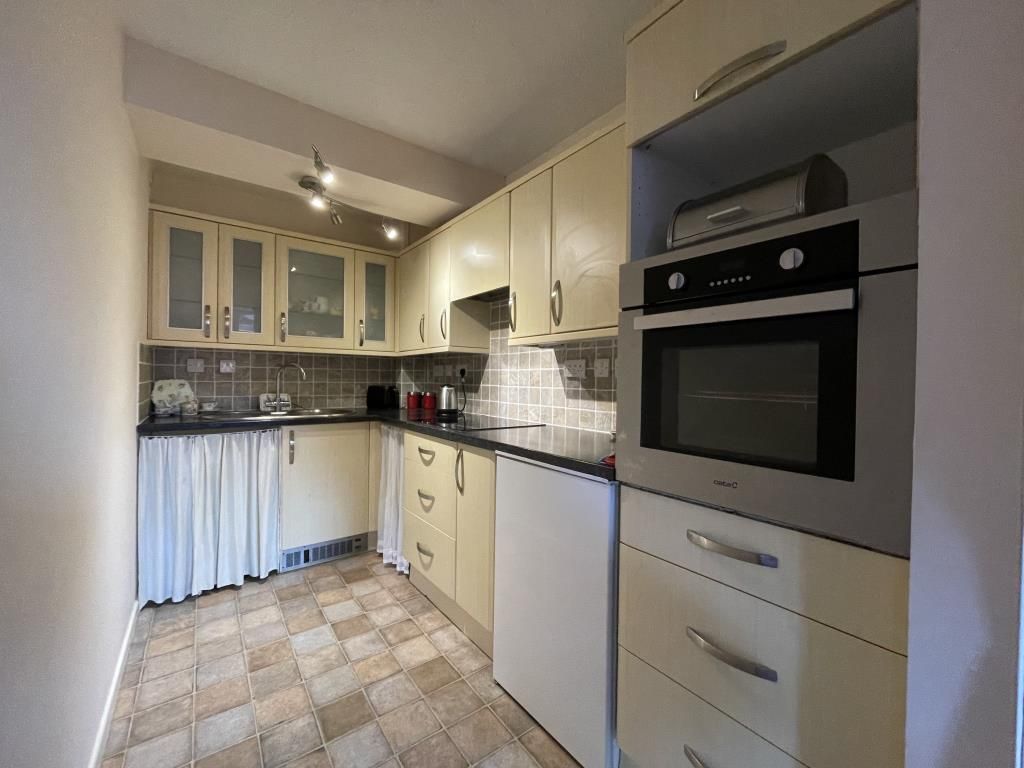 Property photo 3 of 11 Kitchen Entrance