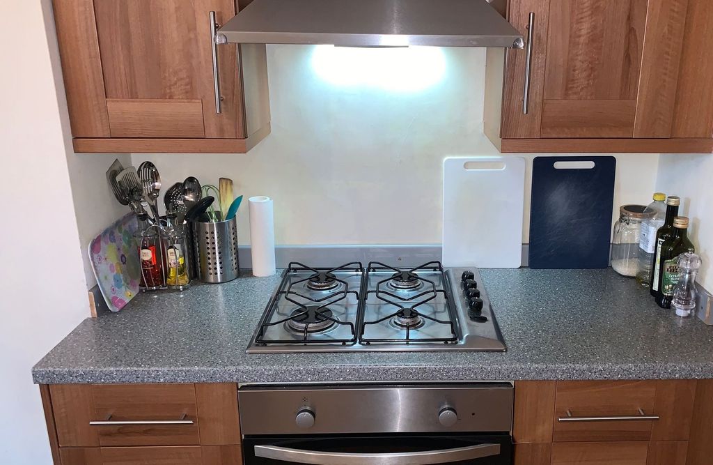 Property photo 3 of 14 A Neat And Functional Kitchen Featuring A Gas Hob ...