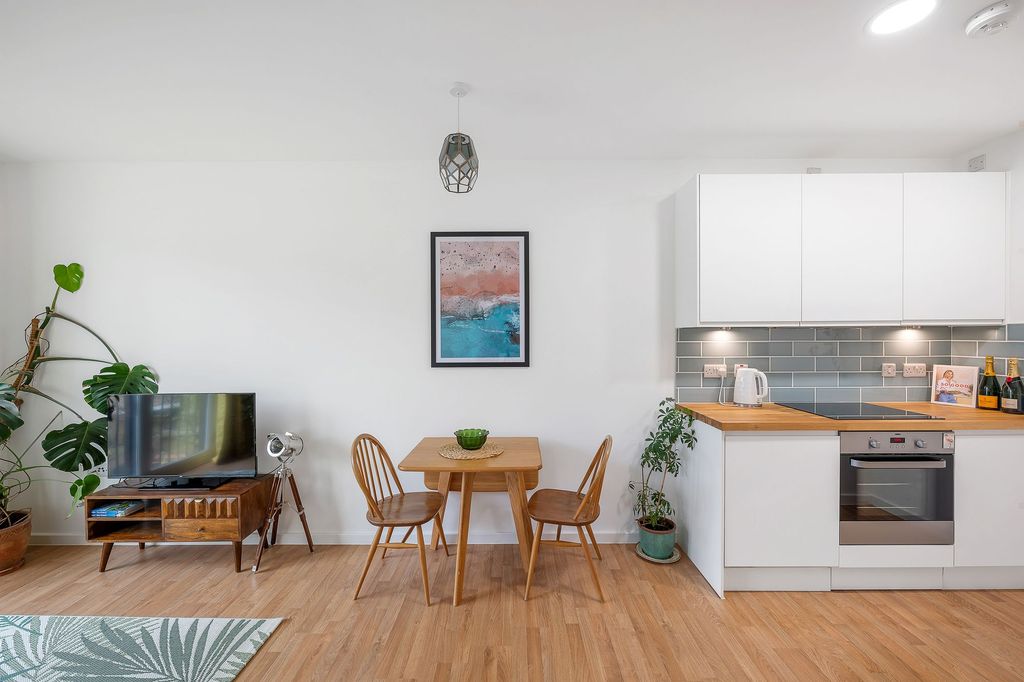 Property photo 1 of 17 Kitchen Living Area