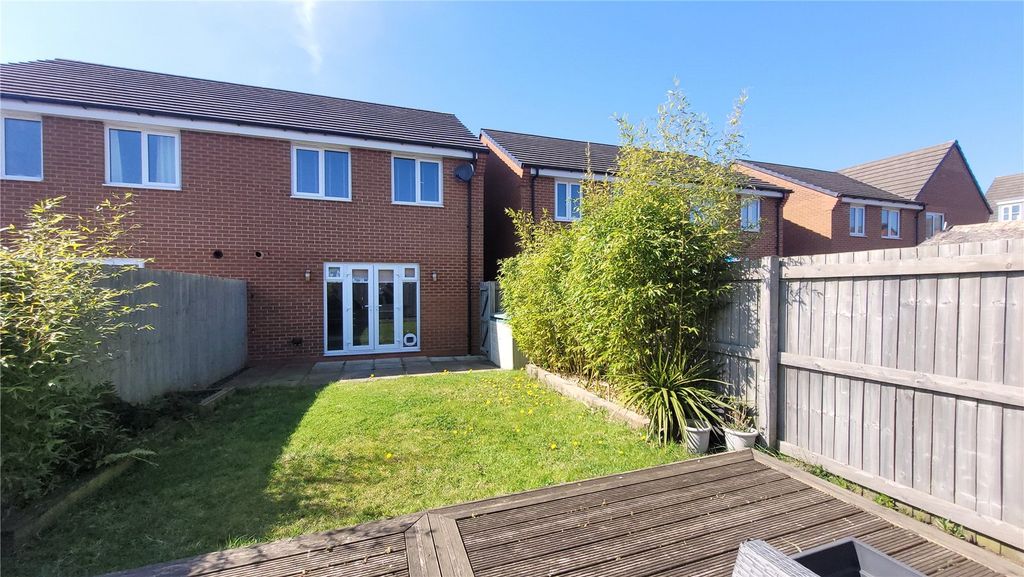 Property photo 2 of 12 Rear Garden