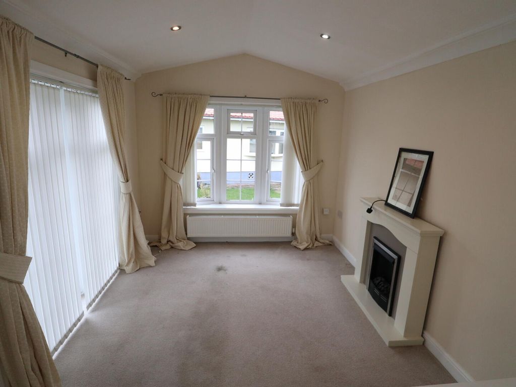 Property photo 3 of 12 Living Room