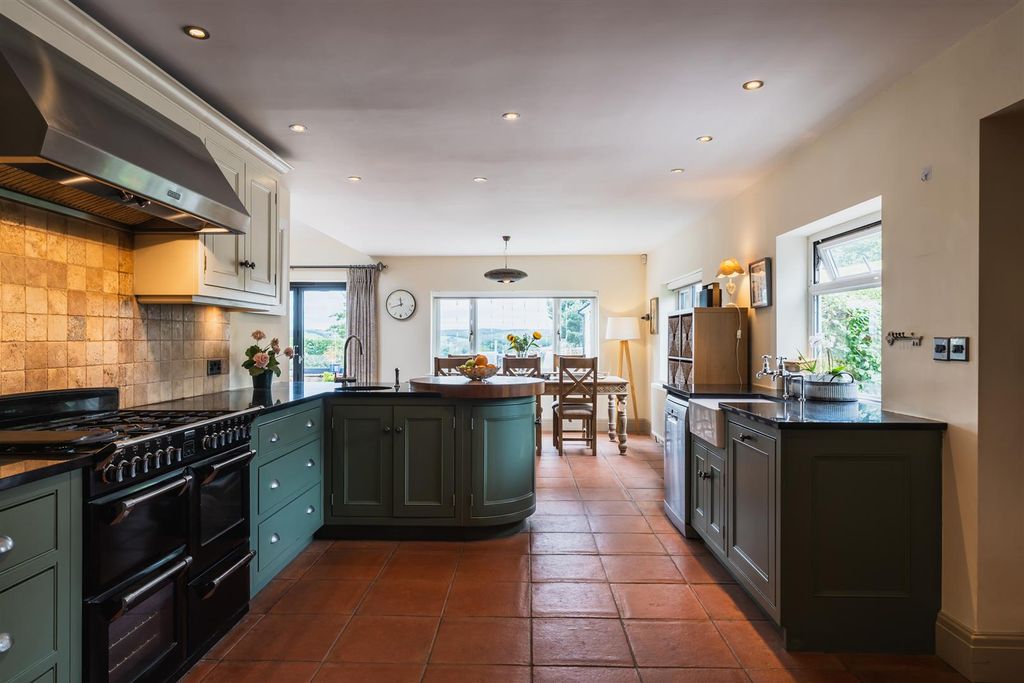 Property photo 2 of 34 Dining Kitchen