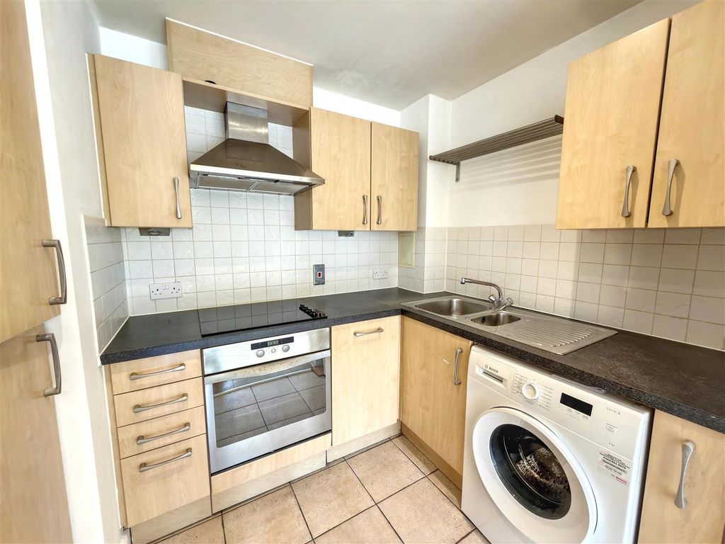 Property photo 3 of 12 Kitchen