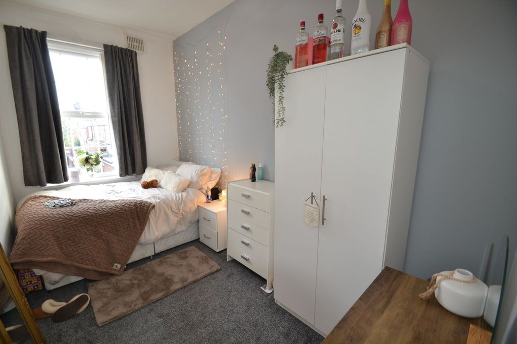 Property photo 1 of 26 A Cozy Bedroom Illuminated With Natural Light From...