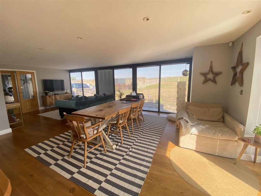 Property photo 3 of 20 Dining Room To Lounging Area