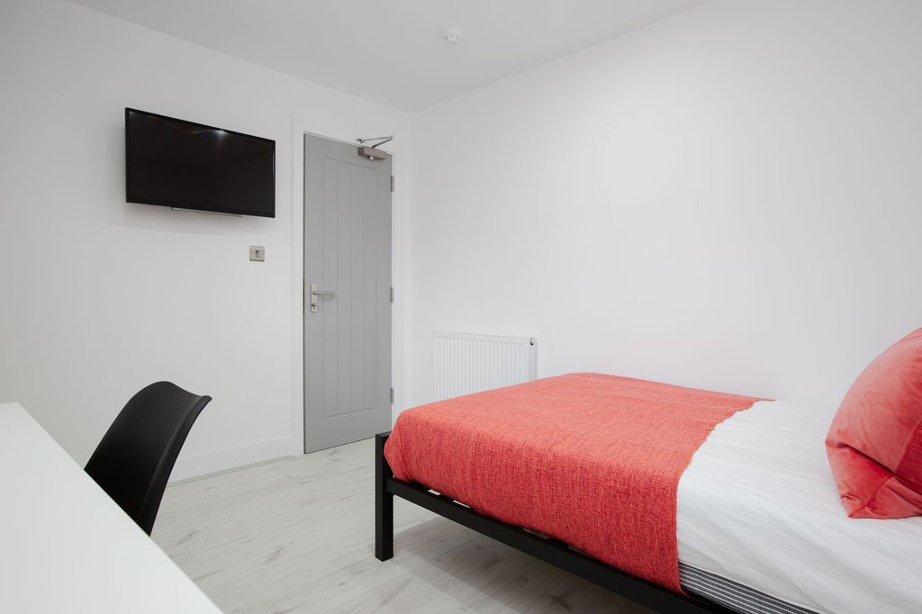 Property photo 2 of 6 A Bright And Clean Bedroom Featuring A Comfortable...