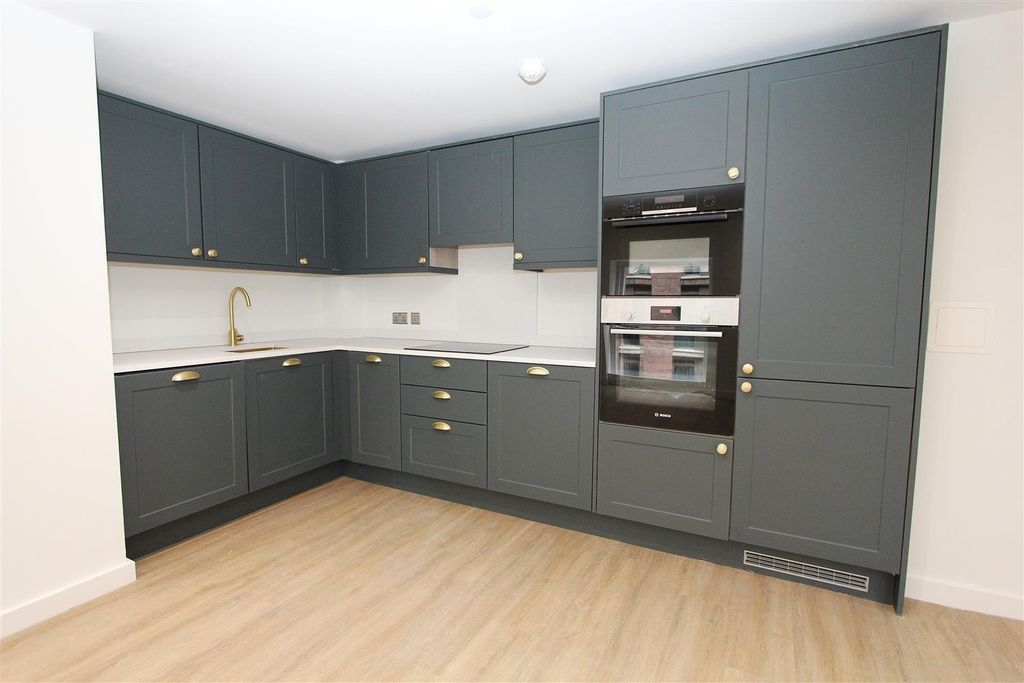 Property photo 2 of 18 Modern Kitchen With Chic Charcoal Grey Cabinets....