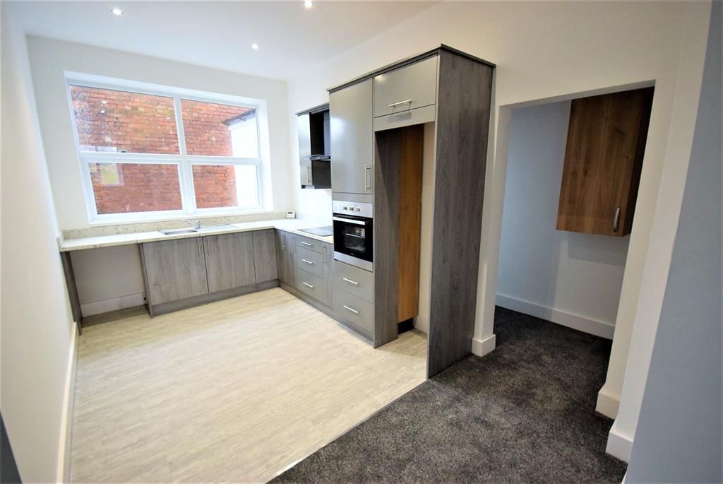 Property photo 3 of 13 Kitchen