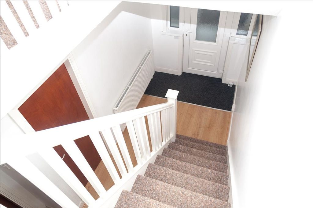 Property photo 1 of 19 A Well-Lit Staircase Leading To The Entrance, Feat...