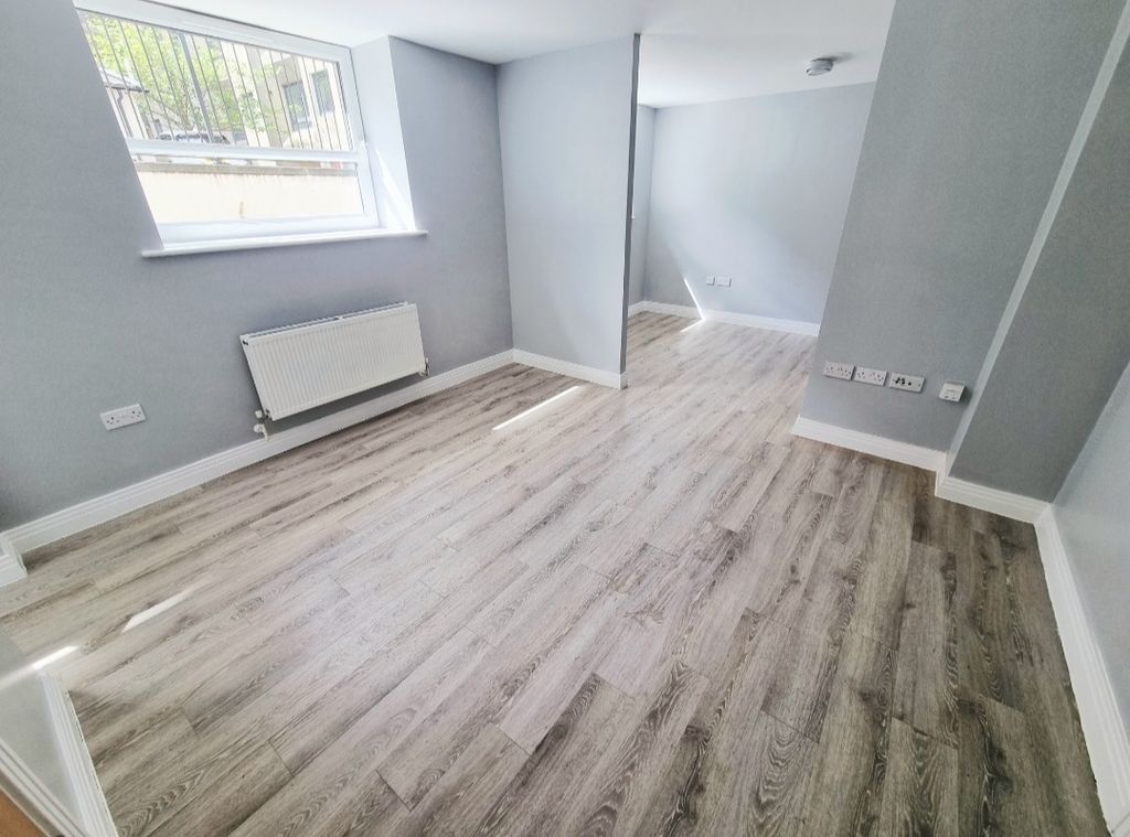 Property photo 1 of 8 Living Room Area