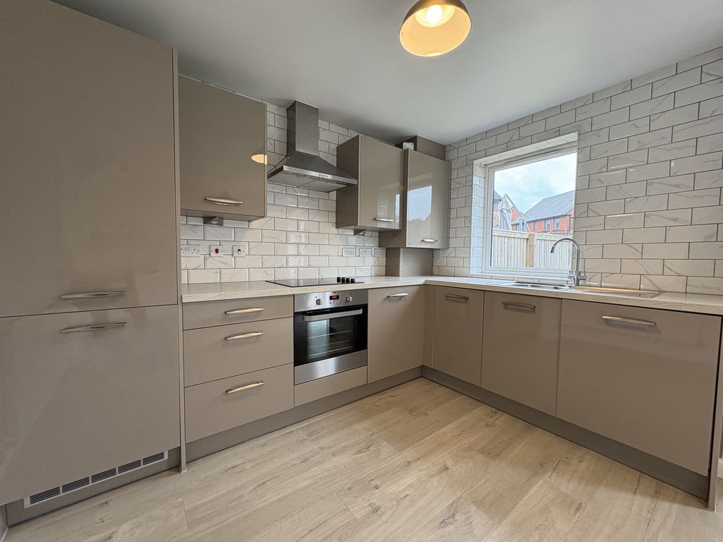 Property photo 2 of 12 Kitchen