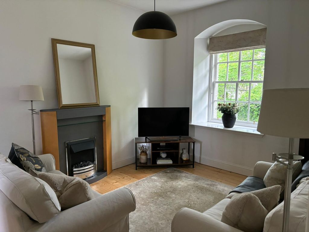 Property photo 1 of 17 Living Room 2