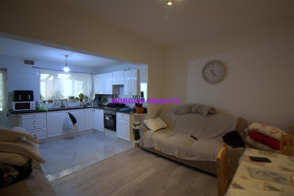 Property photo 3 of 11 Living Room: