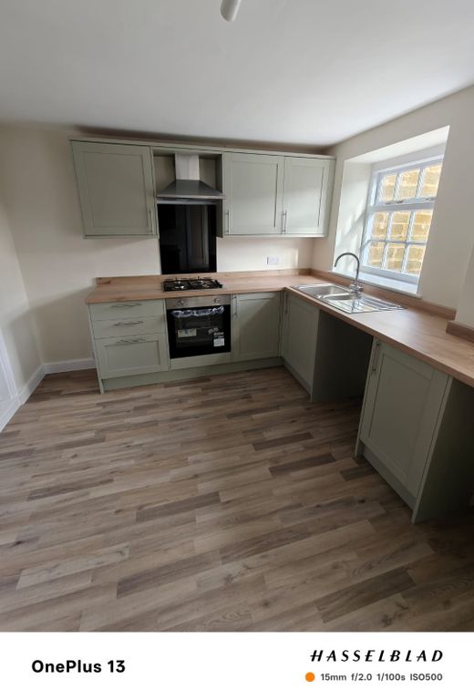 Property photo 3 of 13 Kitchen