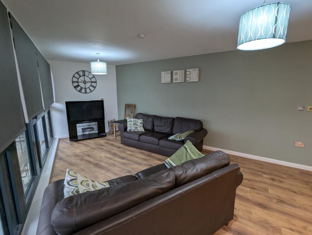 Property photo 3 of 12 Front Description 2