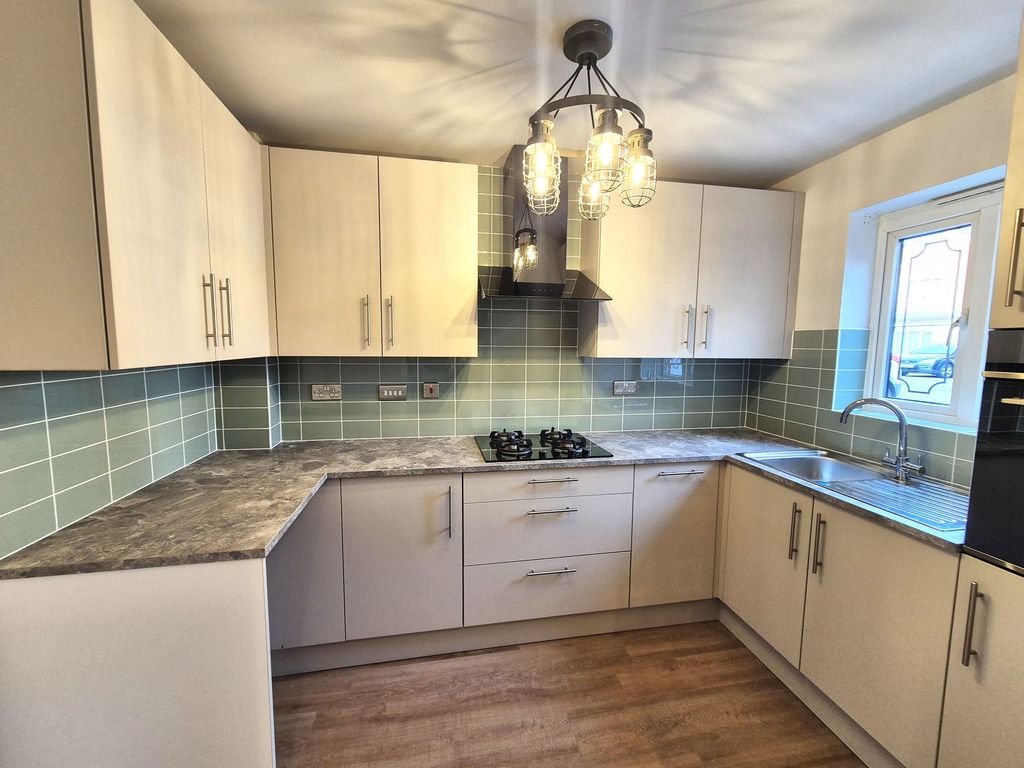 Property photo 2 of 12 Kitchen